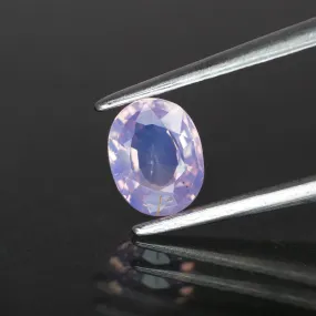 Sapphire opalescent | natural, pinkish purple, oval cut *6x5 mm, VS , 0.70ct